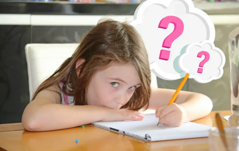 Confused child sitting at a desk while struggling with homeschool work.